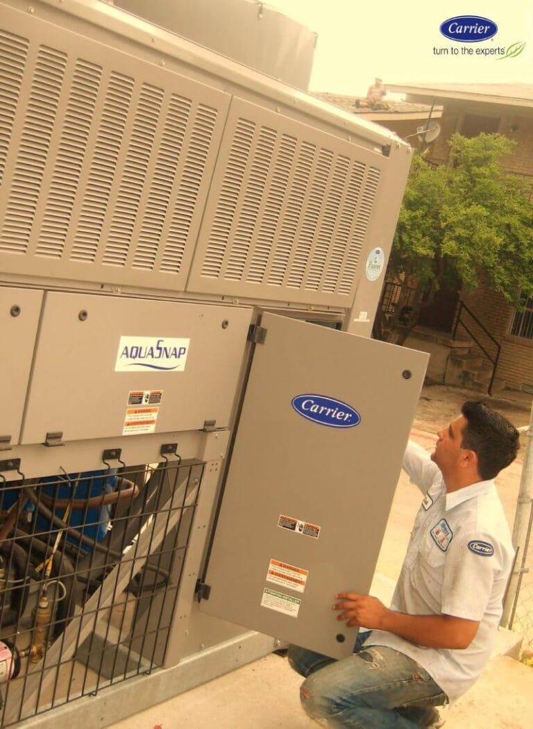 Man servicing outside unit